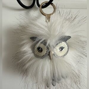 Kate Spade Snowy Owl Pouf keychain.